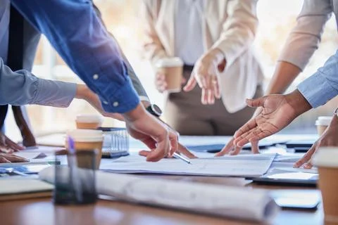 Engineering, teamwork and hands with blueprint planning construction project in Stock Photos