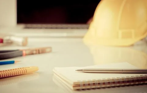 Engineering tools and blank notebook on office table Stock Photos