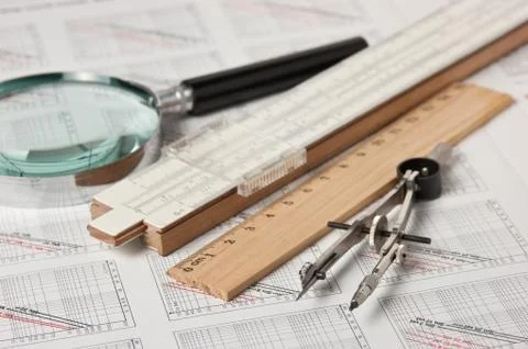 Engineering tools on technical drawing Stock Photos
