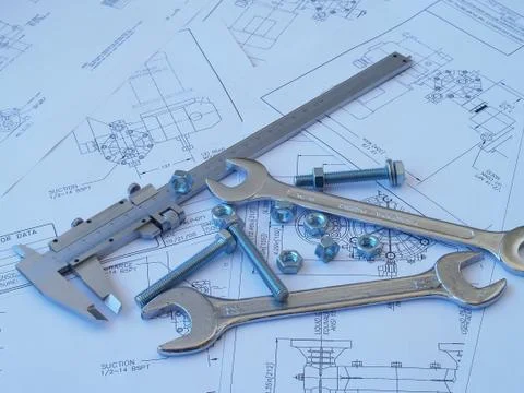Engineering tools on technical drawing Stock Photos