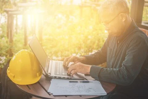 Engineering using computer working check building construction by internet te 스톡 사진