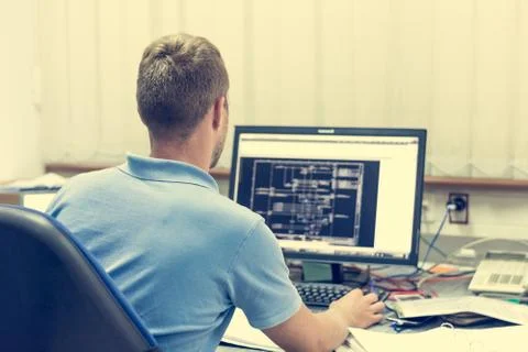 Engineering working on computer. Stock Photos