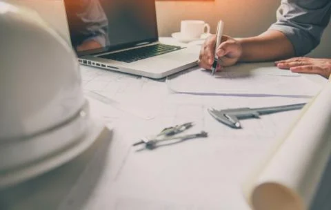 Engineering is working on the design, construction on the work table with wor Stock Photos