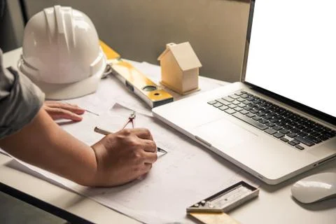 Engineering is working on the design, construction on the work table with wor Stock Photos