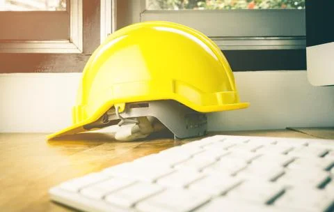 Engineering working office table ith computer and working helmet 스톡 사진