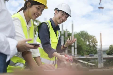 Engineers and Architect working and discussing detail of design project tog.. Stock Photos