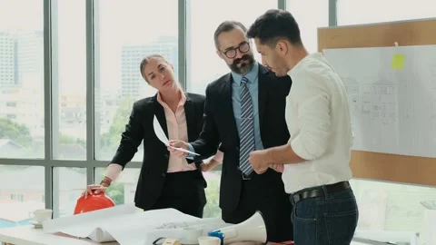 Engineers and architects work on planning, measuring, building patterns, blue Stock Footage 153646808