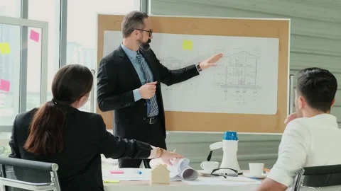 Engineers and architects work on planning, measuring, building patterns, blue Stock Footage 153653262