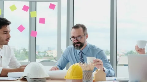 Engineers and architects work on planning, measuring, building patterns, blue Stock Footage 153663508