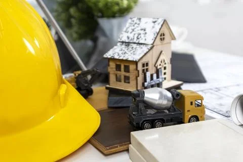 Engineers and architects work on residential building design, construction .. Ilustración de archivo