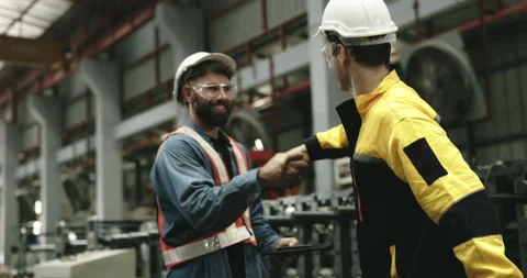 Engineers and technicians are overseeing mechanical maintenance project Stock Footage 254540706