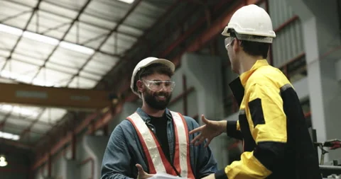 Engineers and technicians are overseeing mechanical maintenance project Stock Footage 254540986