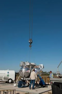Engineers and technicians prepare NASA s Project Morpheus prototype lander... Stock Photos