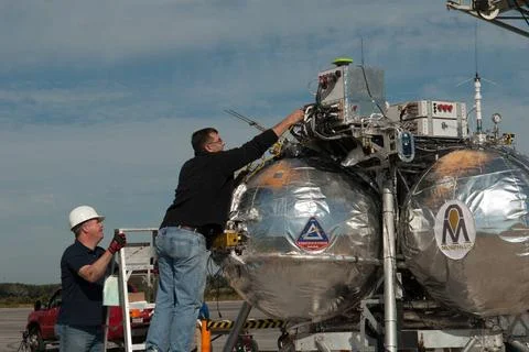 Engineers and technicians prepare NASA s Project Morpheus prototype lander... Stock Photos