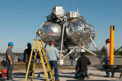 Engineers and technicians prepare NASA s Project Morpheus prototype lander... Stock Photos