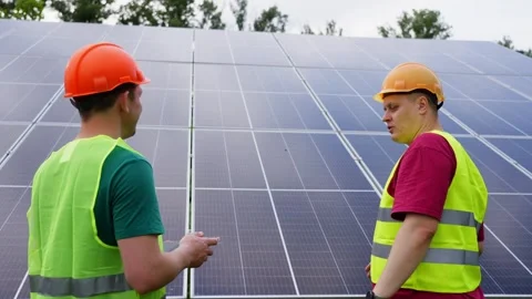 Engineers are adjusting the operation of a solar panel. Stock Footage 313234705