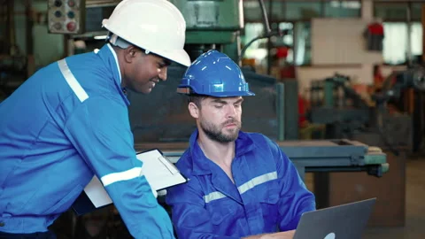 Engineers are inspecting work pieces that technicians Stock Footage 258487789