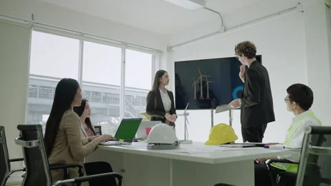 Engineers are presenting a model for electricity generation Stock Footage 149139652