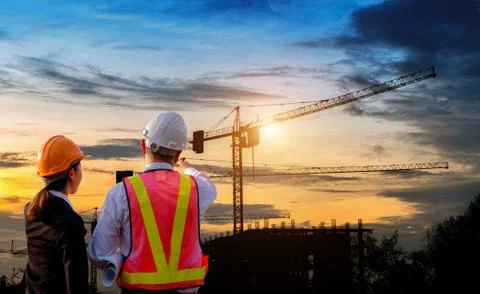 Engineers are standing work on construction. Stock Photos