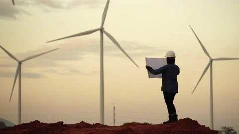 Engineers are working outdoors to check the wind turbine system Stock Footage 144895321