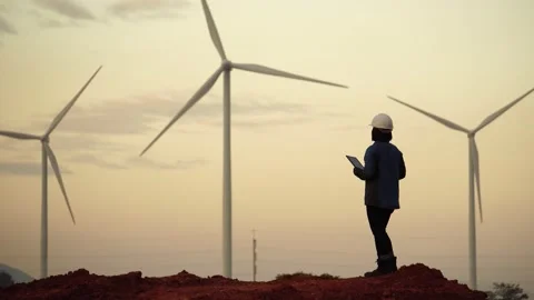 Engineers are working outdoors to check the wind turbine system Stock Footage 144895463