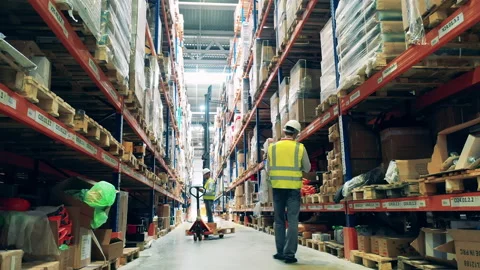 Engineers are working on the storage premises Video stock 159337935