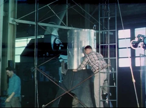 Engineers assembling capsule with sheet metal during Mercury Project Video stock 297465002