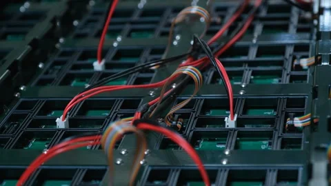 Engineers assembling an electronic circuit and LED screen Stock-Footage 292025223