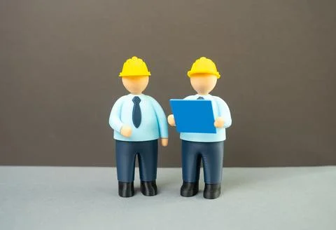 Engineers with blueprints, design and planning, construction concept. Archite Stock Photos