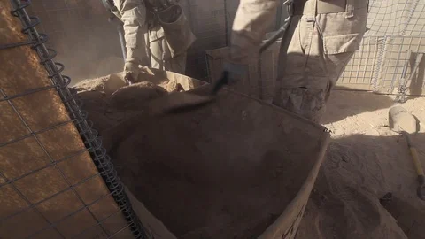 Engineers build a post while constructing a forward operating base - 2010 Stock Footage 107544390