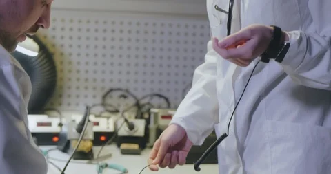 Engineers carrying ut experiment Stock Footage 112057972
