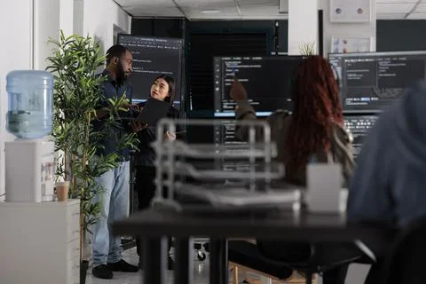 Engineers checking artificial intelligence code 写真素材