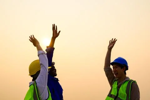 Engineers checking solar panels on solar power plant Stock Photos