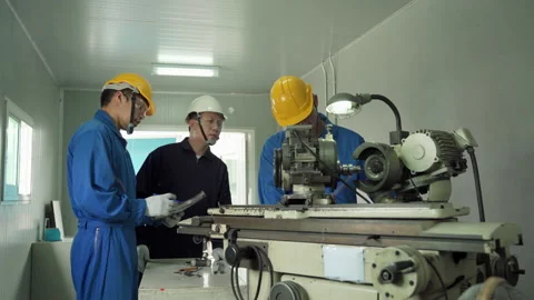 Engineers come in to inspect the machinery maintenance work Stock Footage 139995322