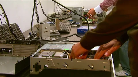 Engineers compiles parts of a computer. Computer hardware Stock Footage 75461721