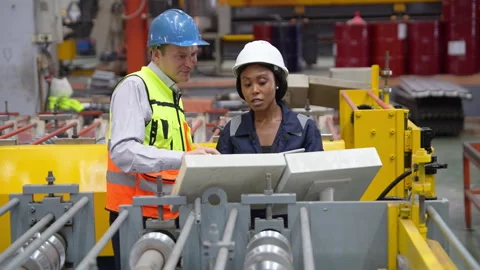 Engineers Conducting Quality Control Audit in Industrial Factory Stock Footage 343309601