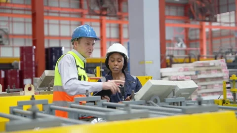 Engineers Conducting Quality Control Audit in Industrial Factory Stock Footage 343309762