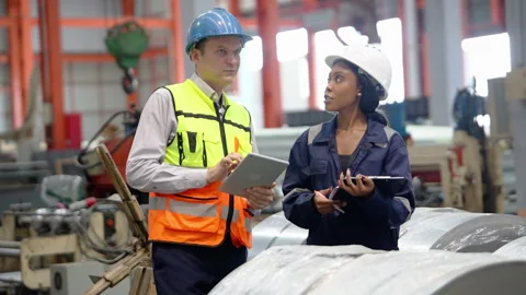 Engineers Conducting Quality Control Audit in Industrial Factory Stock Footage 343312157