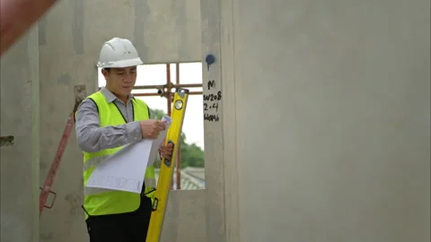 Engineers construction projects inspect and supervise the construction Stock Footage 309940628