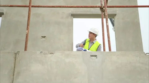 Engineers construction projects inspect and supervise the construction Stock Footage 309941081