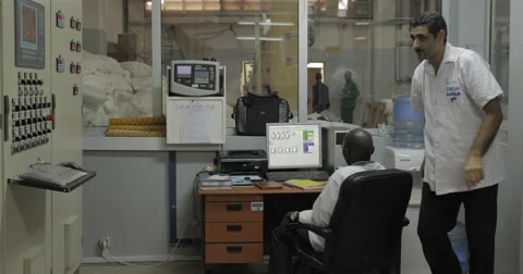 Engineers In The Control Room Of Soap And Detergent Factory (4K) Stock Footage 60939050
