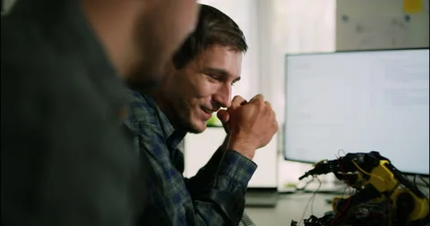 Engineers Debugging Robotic Arm Code in Lab. Stock Footage 306737063