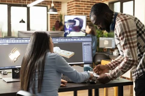 Engineers designing mechanical prototypes Stock Photos