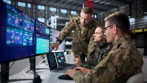Engineers At Desktop Computers Develop Rocket Designs For Space Automation. Stock-Fotos