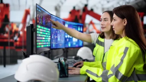 Engineers Developing Automated Manufacturing System 動画素材 303663738