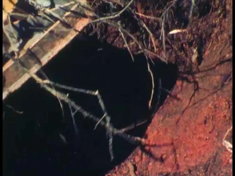 Engineers dig a hole in the ground with bulldozers and plant dynamite bomb that Stock Footage 75302146