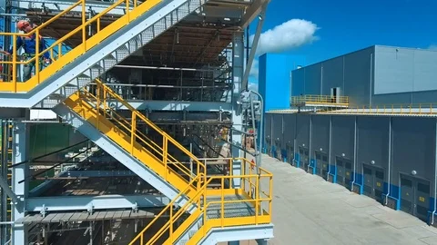 Engineers discussing a new project. Large industry background Video stock 72072662