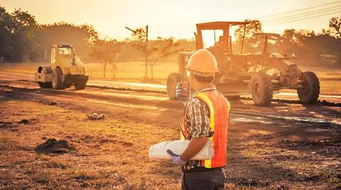 Engineers discussion with architects work planing in construction site Stock Photos