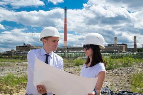 Engineers examing blueprints 스톡 사진