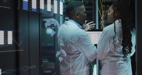 Engineers explaining network issue at racks, plugging cable, stabilizing Stock Footage 309807661